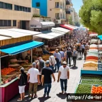 Home 21 이스라엘의 고대 및 현대 조화된 문화 - A vibrant street market scene in Tel Aviv during daytime, showcasing colorful stalls filled with fre...